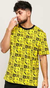CALVIN KLEIN JEANS M Flyer AOP Relaxed Tee žluté / černé M